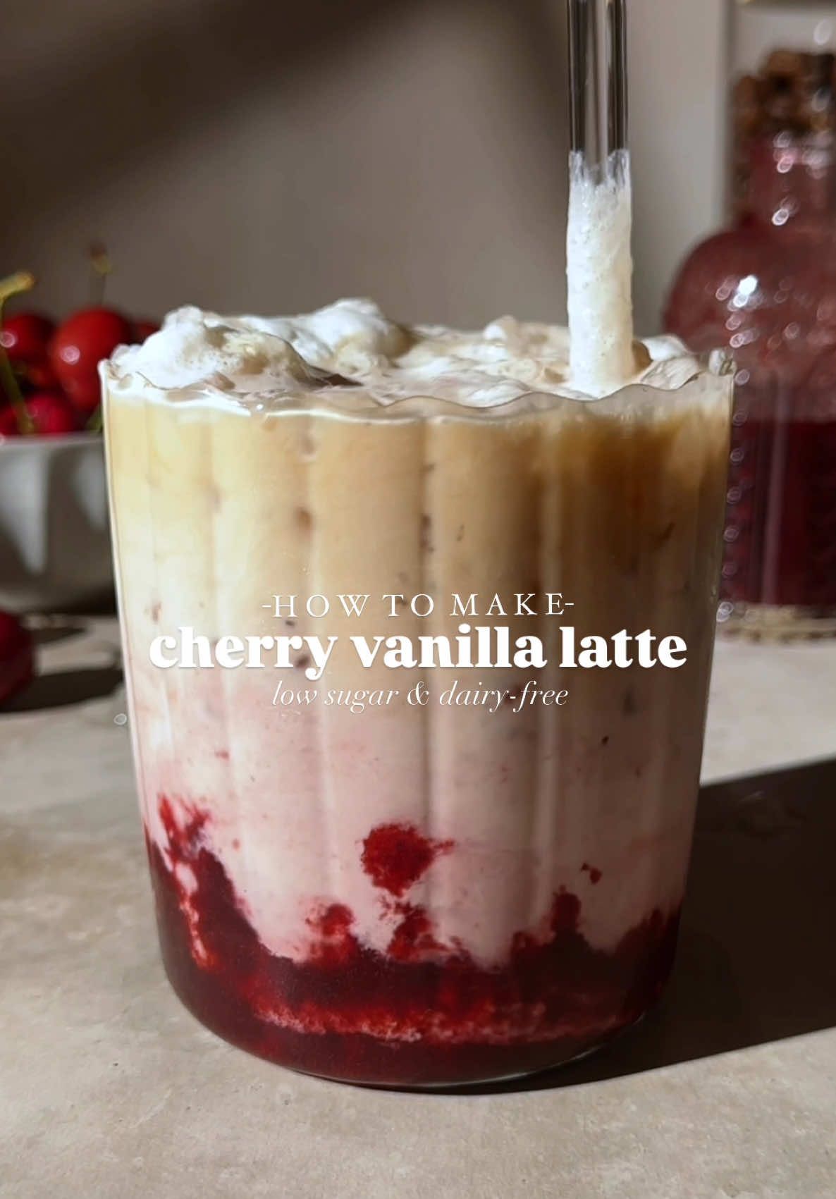 Full recipe below for this Low-Sugar Cherry Vanilla Latte! 🍒☕ ✨My glasses, blender, or coffee machine I used to make this drink is linked in my profile! ✨Low Sugar Cherry Sauce✨ Ingredients: ✨2 cups frozen cherries ✨1/2 cup water ✨1 1/2 teaspoons vanilla extract ✨1/4 cup allulose (adjust to taste) can use coconut sugar or regular sugar here 🍒Note: I always use allulose for low-sugar syrups because it won’t crystallize in the fridge. If you use monk fruit, the sauce may start to crystallize after a few days. Instructions: Cook the cherries – In a small saucepan over medium heat, add the frozen cherries, water, and allulose. Simmer – Bring the mixture to a simmer and cook for about 8-10 minutes, stirring occasionally, until the cherries soften and release their juices. Remove from the heat and add in the vanilla extract. Blend – Use an immersion blender directly in the pot or transfer the mixture to a blender and blend until smooth. Adjust consistency – If the sauce is too thick, add a little more water until it reaches your desired consistency. 🍒Cherry Vanilla Latte🍒 2-3 tbsp cherry sauce (see recipe above) 1-2 shots espresso 3 tbsp milk of choice (almond, coconut, or regular milk) 2 tbsp heavy cream (regular or dairy-free) ¼ tsp vanilla extract (optional, for extra flavor) Instructions: Brew the espresso – Prepare 1-2 shots of espresso using a Nespresso, espresso machine, or strong brewed coffee. Froth- Froth the milk, cream and vanilla extract using a milk frother or whisk until slightly foamy. Assemble the latte – Fill a glass with ice and then pour in the cherry sauce, followed by the espresso and milk mixture. Stir well to combine. Top & enjoy – Optional: Garnish with an extra drizzle of cherry sauce or a sprinkle of cinnamon.  #cherrylatte #cherry #latte #lowsugar #coffee #diaryfree #coffeelover #coffetime #foodphotography #viralrecipes