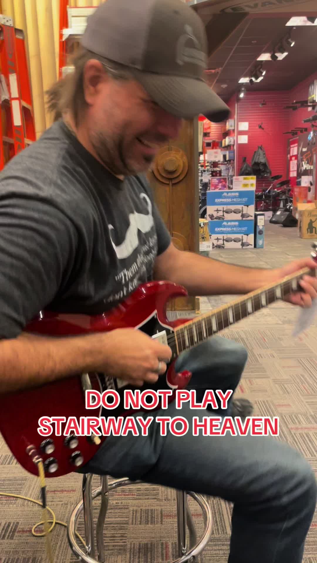 "No Stairway? Denied." I decided to have some fun with friends at @Guitar Center   Stairway to Heaven is amazing, and @Led Zeppelin is the GOAT. Also, I'm falling in love with @Gibson Guitar SGs. Thanks Doc Holladay for the video. #StairwayToHeaven #WaynesWorld #LOL #Funny #Humor #Fun #Friends #HaveFun #Jokes #GuitarCenter #MusicStore #Guitar #Musician #Producer #AudioEngineer #Music #NewMusic #Indie #Guitarist #RockNRoll #RockGuitar #LedZeppelin #GOAT #Gibson #GibsonGuitars #RockBand #ForYou #FYP 