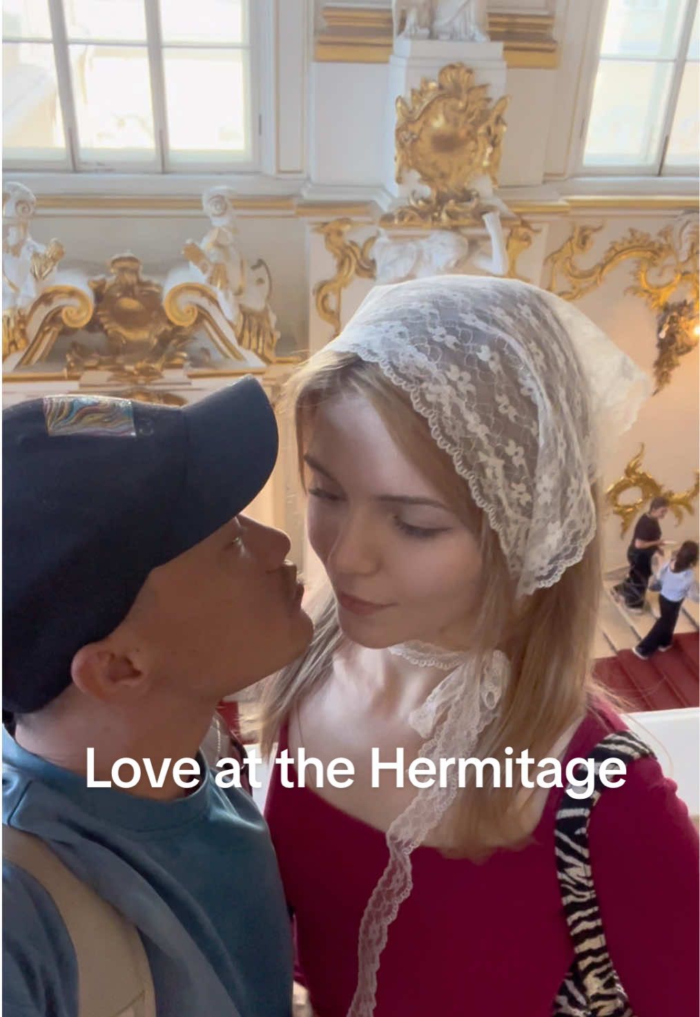 In St. Petersburg’s grand Winter Palace,   hearts awaken, love takes flight—   Trust the magic of a tender kiss,   for these halls defy the night.   No frost may linger, no cold may stay,   only warmth, eternal and bright.#Russia #曹觉莎莎夫妇 #love #Internationalcouples #travel 